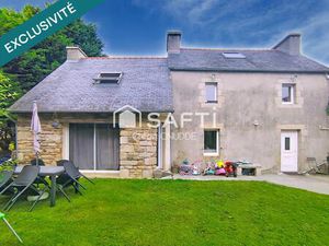 Maison avec grand hangar