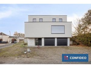 Moderne  af te werken woning op een perceel van 10a 58ca.