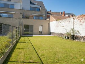 Recent gelijkvloers appartement met 2 slaapkamers in centrum Herent.