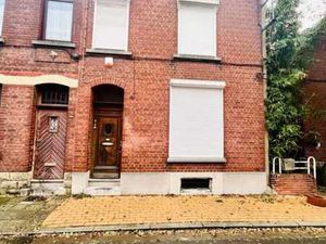 Maison 2 façades avec cour et garage