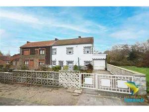 Maison 3 façades avec garage