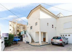 Ensemble immobilier avec garage et terrasses