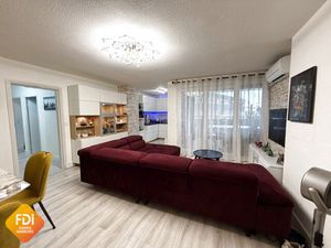 Centre-village - T 3 - 71 m2- parking privatif en sous-sol