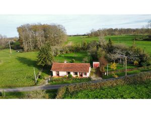 Charmante maison de plain-pied sur grand terrain arboré de 2000 m²  à 8 minutes des Arcade