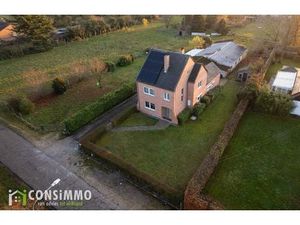 Ruime vrijstaande woning met 5 slaapkamers  loods en 50a perceel in Genk-Zuid