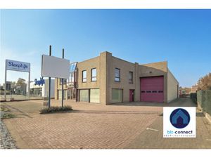 veelzijdig bedrijfsgebouw met woonst op een absolute commerciële topligging