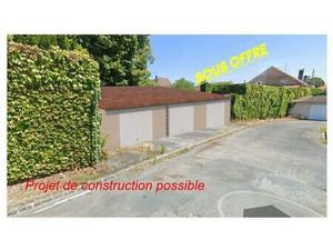 Terrain en hyper centre avec P.C accordé pour construire 3 garages de plus de 25m2 chacun