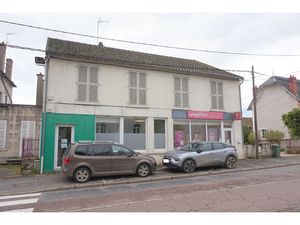 Immeuble 260 m2 loué en partie et son jardin clos