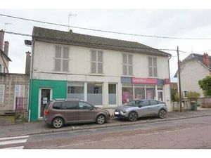 Immeuble 260 m2 loué en partie et son jardin clos