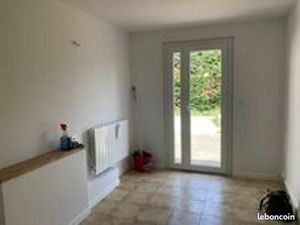 Craponne centre maison de ville T3 55M2 - parking et jardinet