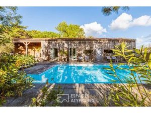 Maison à ossature bois  douceur de vivre les pieds dans le sable