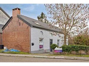 Maison 4 façades avec beaux volumes et jardin