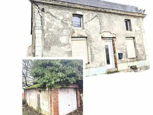 Maison 4 façades avec garage et terrain de 5 ares