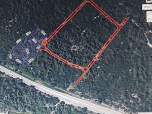 Nîmes  terrain de loisirs en zone N  boisé  6500 m²