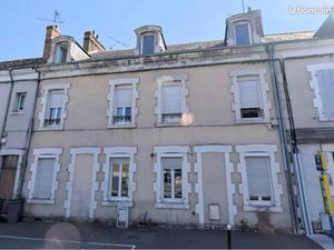 Ensemble immobilier complet – Immeuble + Maison + 15 garages 100% Loué