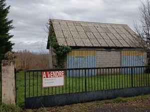 Garage pouvant être aménagé en maison avec terrain