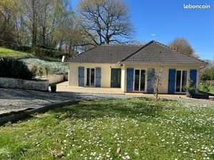 Maison avec grand jardin et garage