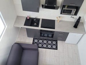 T1 mezzanine moderne – 1er étage – faibles charges