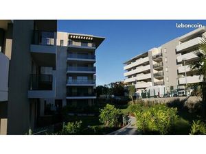 T2 rez de jardin avec grande terrasse + parking dans résidence standing avec piscine