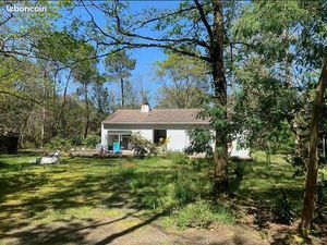 Maison dans un espace de verdure  proche des commerces et des plages
