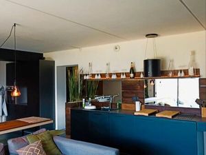 À la location : appartement en rez-de-jardin d'une maison contemporaine avec vue paradisia