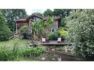 Chalet en bois avec terrain de 2 000 m2 à Eymouthiers !