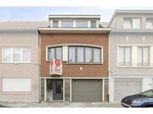 Ruim huis te koop Merksem met garage en zonnige tuin