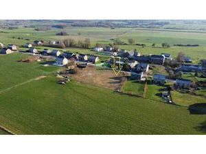 Terrain plat – villa 4 façades – façade ±26 m – vue campagne