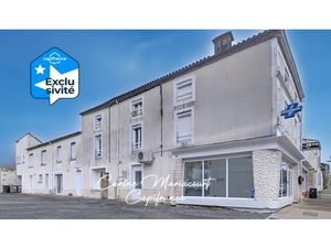 Immeuble de rapport au cœur de La Crèche (79): deux T2  deux T3 et un local commercial