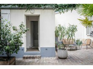 Maisonnette sur cour au coeur des Batignolles