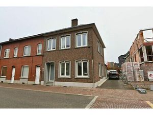 Instapklare woning in hartje Sint-Truiden met dubbele garage en stadstuin