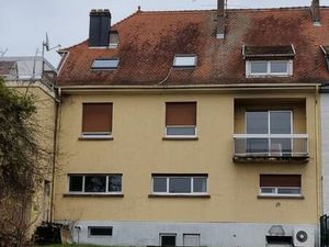 Immeuble avec 1 magasin et 2 appartements