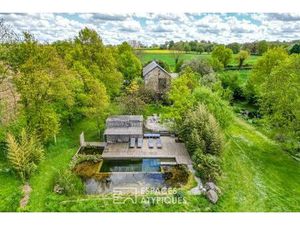 Authentique propriété avec piscine naturelle et lodge au coeur de la campagne