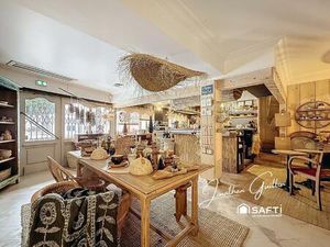 Immeuble composé de locaux commerciaux et d’un appartement – idéal investissement.