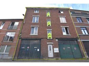 Maison de 6 appartements + 2 garages