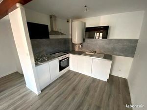 T2 + Petit garage Centre Bourg de Romagnat