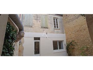 Immeuble avec local commercial - appartements