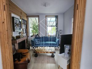 Maison Flamande semi-mitoyenne et ses 3 garages.