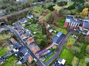 Ensemble immobilier polyvalent (garages + entrepot+ terrain)