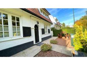 Élégante maison 3 façades de style Art Déco avec jardin