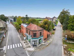 Immeuble mixte : Commerce  bureaux  appartement 1 ch.