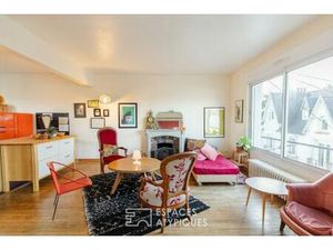 Duplex inspirant avec cheminée et jardin partagé