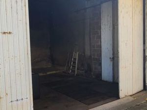 Place de parking dans garage fermé