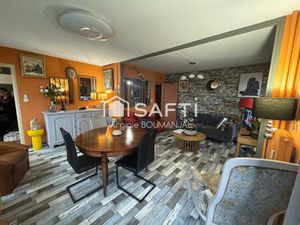 Appartement de 75 m2  2 chambres avec garage et cave à 5 minutes du centre ville