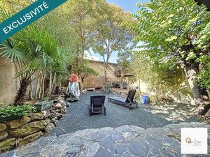 Maison T7 de 160m² avec jardin  caves et garages