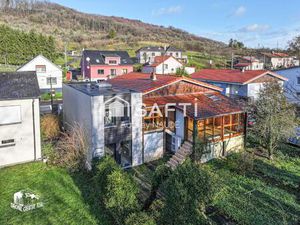 Maison familiale lumineuse avec jardin et véranda
