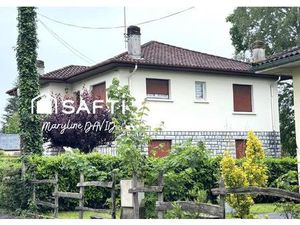 Maison 60's spacieuse avec grand garage et jardin