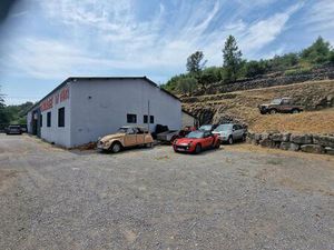 Garage avec partie d'habitation