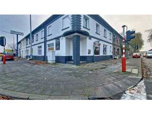 Immeuble commerce + habitation