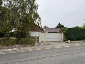 Maison de plain pied sise au calme.